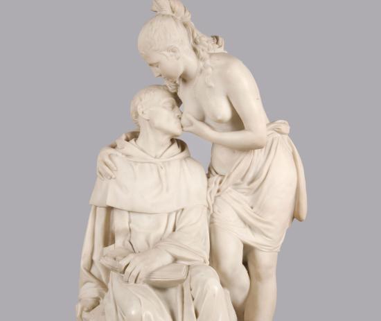 Escultura que representa a una mujer amamantando a un hombre